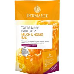 Eine orange-weiße Packung Totes Meer Badesalz mit Milch und Honig.